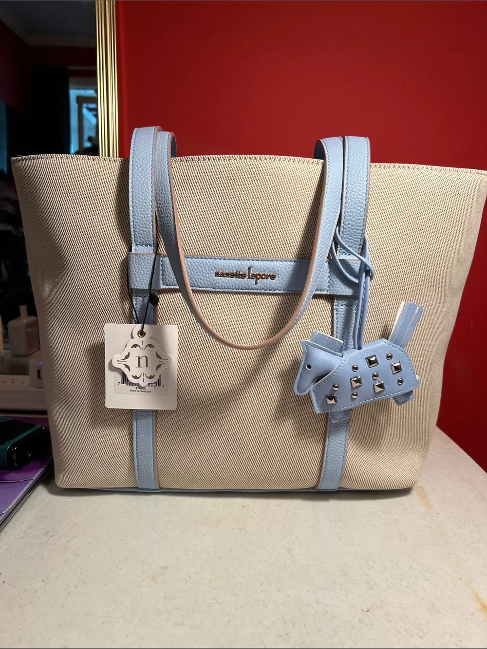 Nanette Lepore Beige Canvas Tote with Light Blue Leather Trim and Charm  RT,148